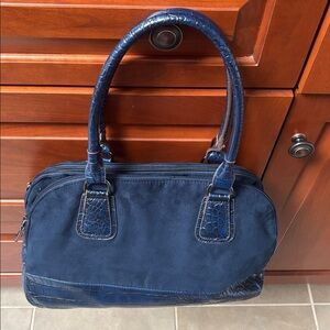 blue suede-like satchel with faux crocodile-embossed leather on trim & handles